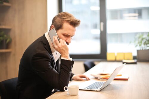 Man interviewing a storage manager over the phone